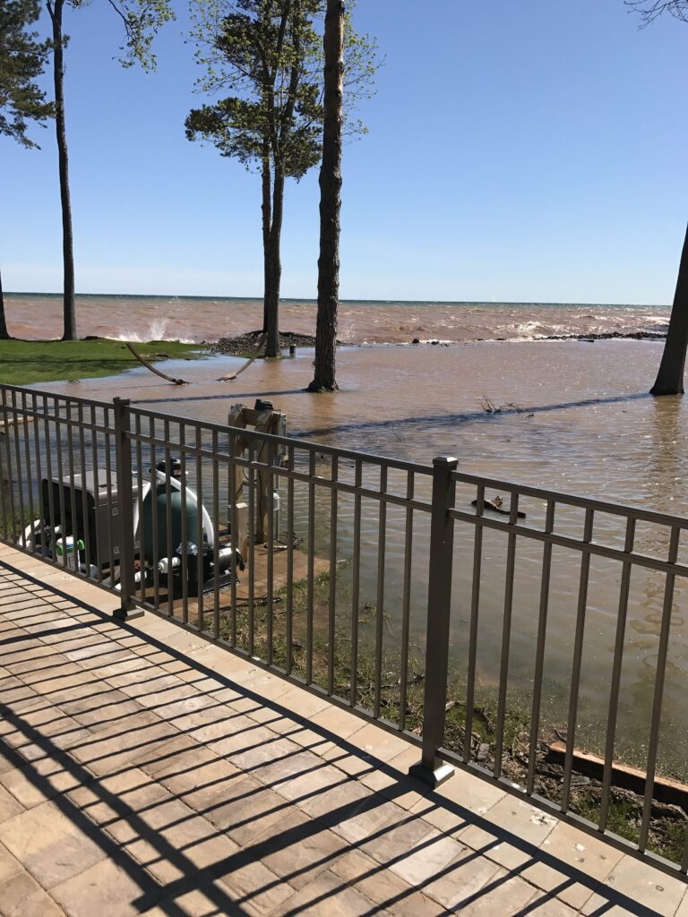 a wood deck overlooking a body of water (MyCoast AI)