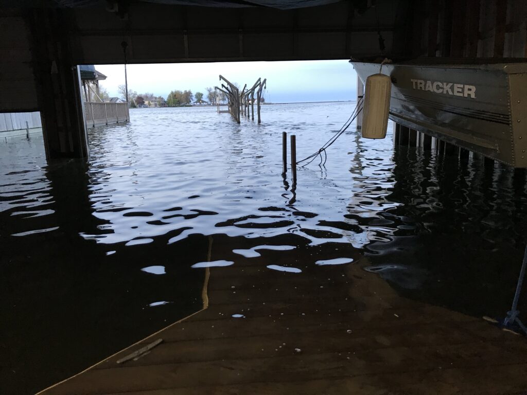 a flooded area with a sign (MyCoast AI)