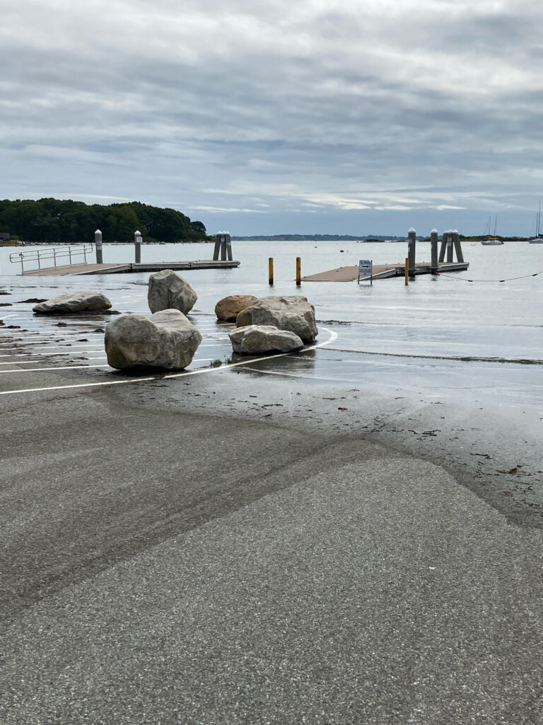 a beach with rocks and a pier (MyCoast AI)