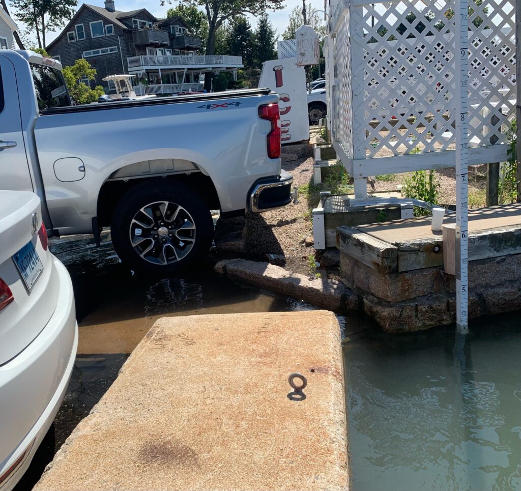 a truck parked next to a fence (MyCoast AI)