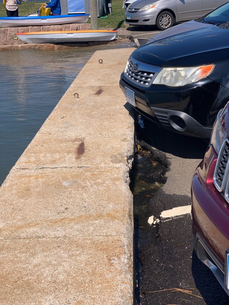 cars parked on the side of a road (MyCoast AI)