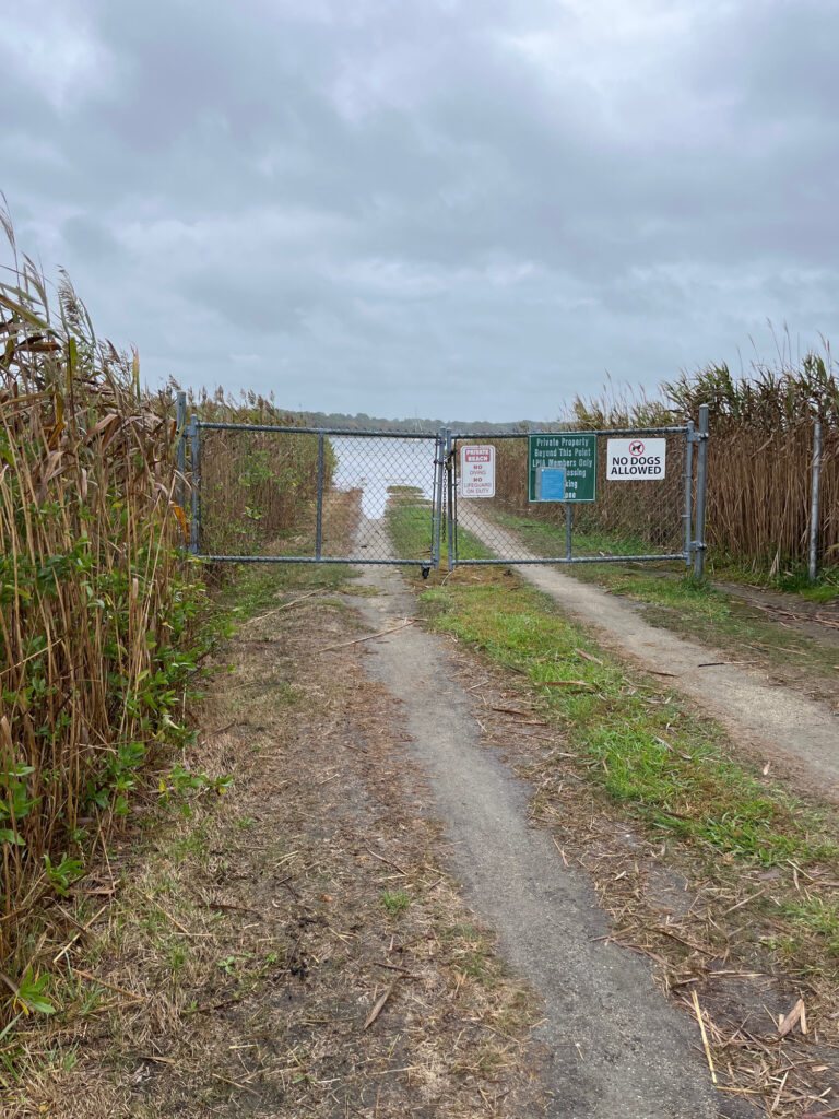 a dirt road with signs on it (MyCoast AI)