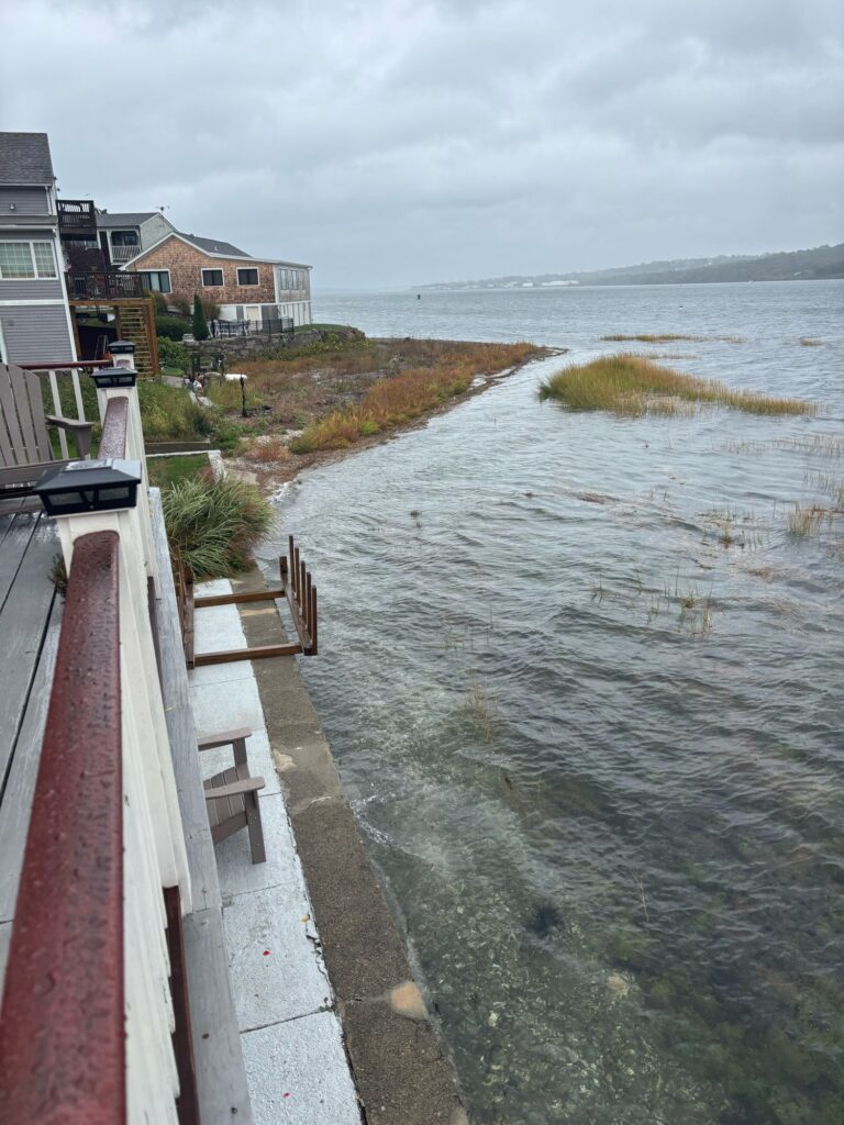 a body of water with buildings along it (MyCoast AI)