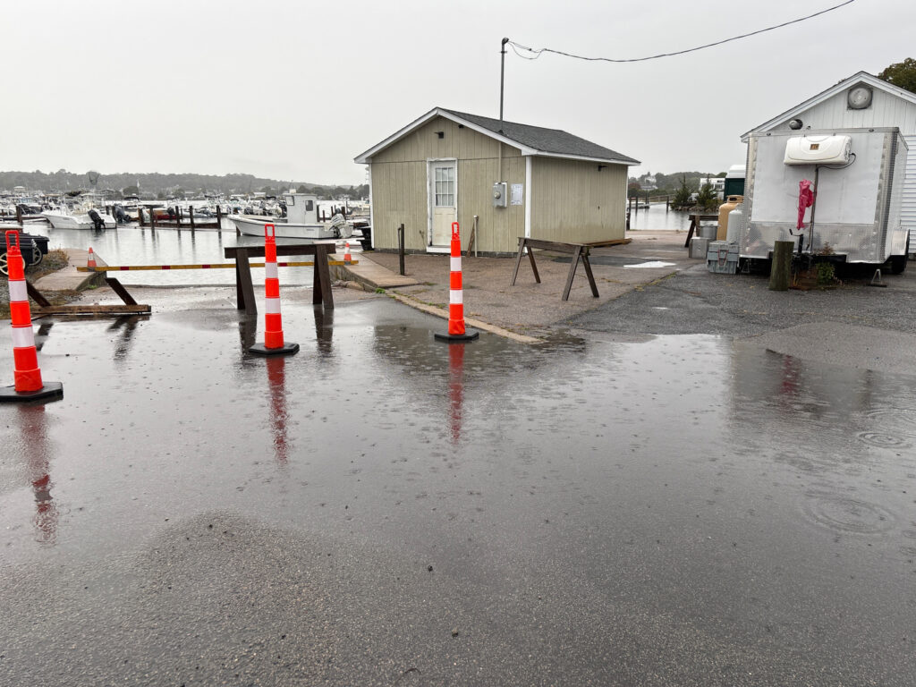 a flooded area with a building and a small house (MyCoast AI)