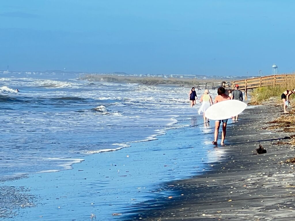 people with surfboards on beach (MyCoast AI)