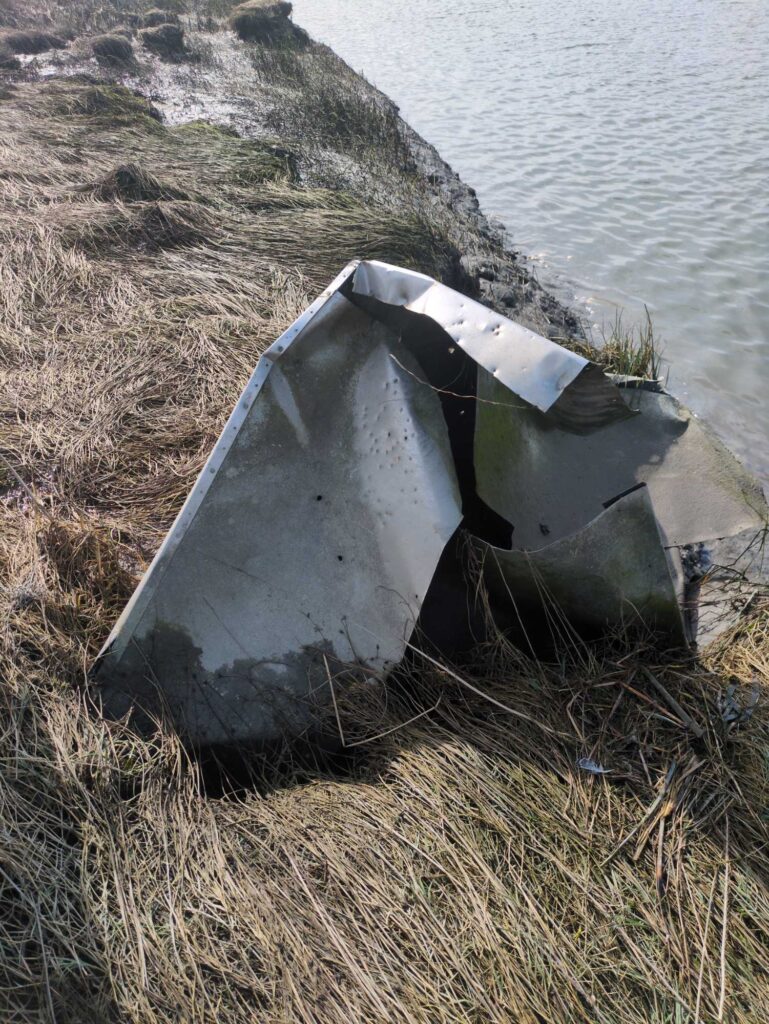 a car on the side of a road (MyCoast AI)