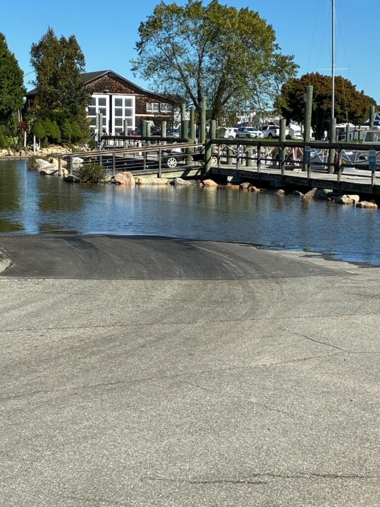 a body of water with a bridge and buildings along it (MyCoast AI)