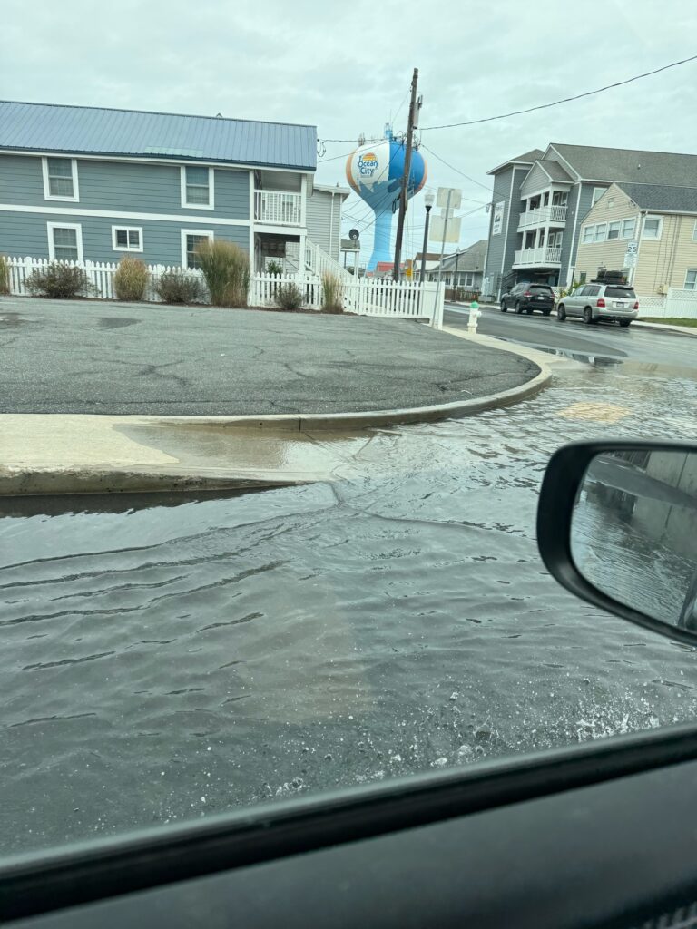 a view of a street from a car window (MyCoast AI)