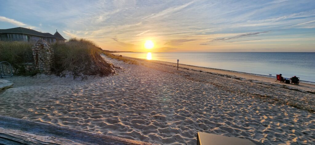 a sandy beach with a sunset (MyCoast AI)