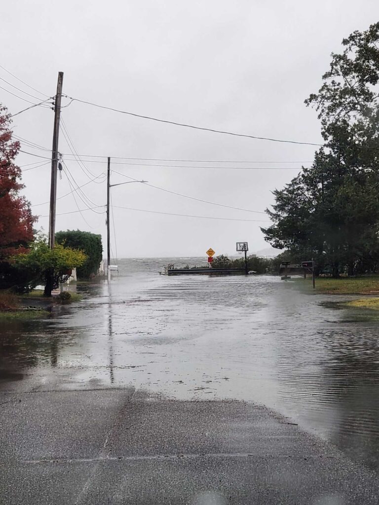 a flooded street with power lines (MyCoast AI)