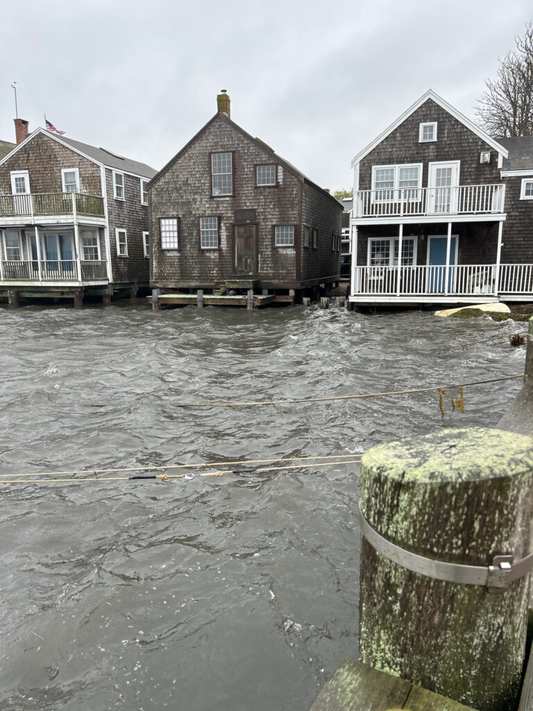 a flooded street with houses (MyCoast AI)