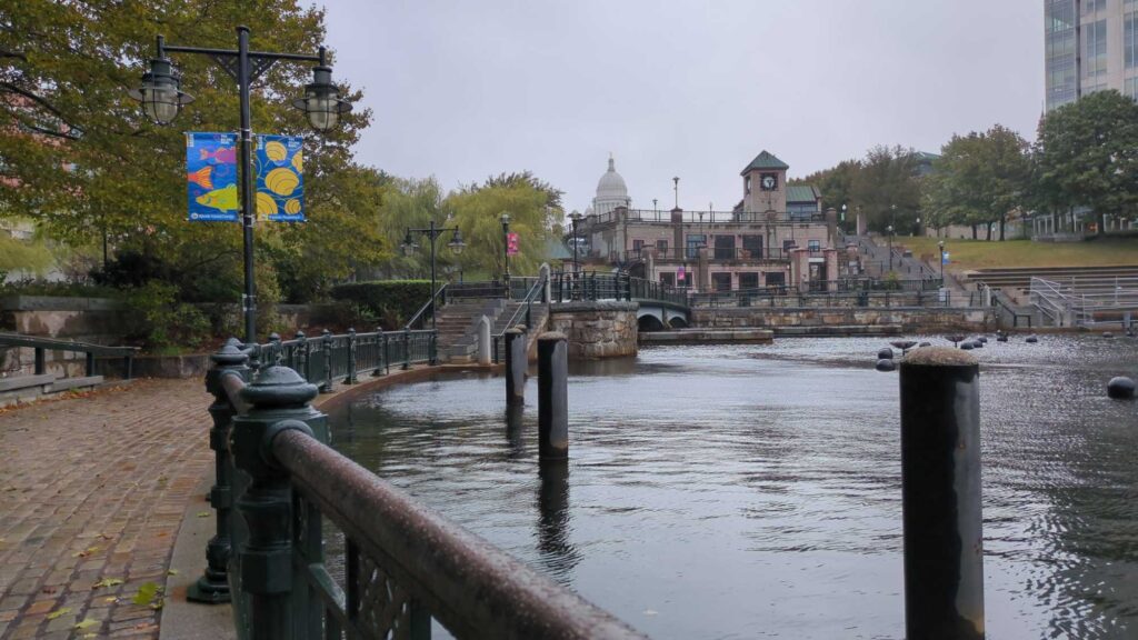 a river with a bridge and buildings (MyCoast AI)
