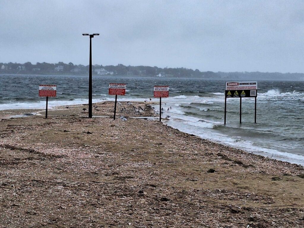 a beach with signs (MyCoast AI)
