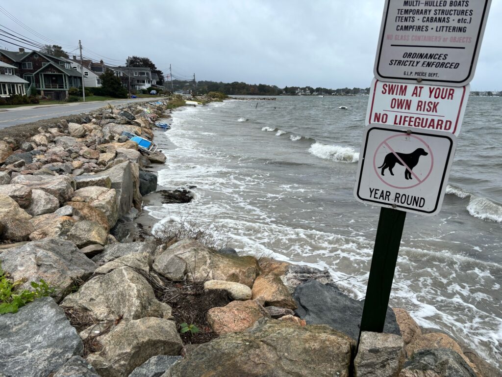 a sign on the beach (MyCoast AI)