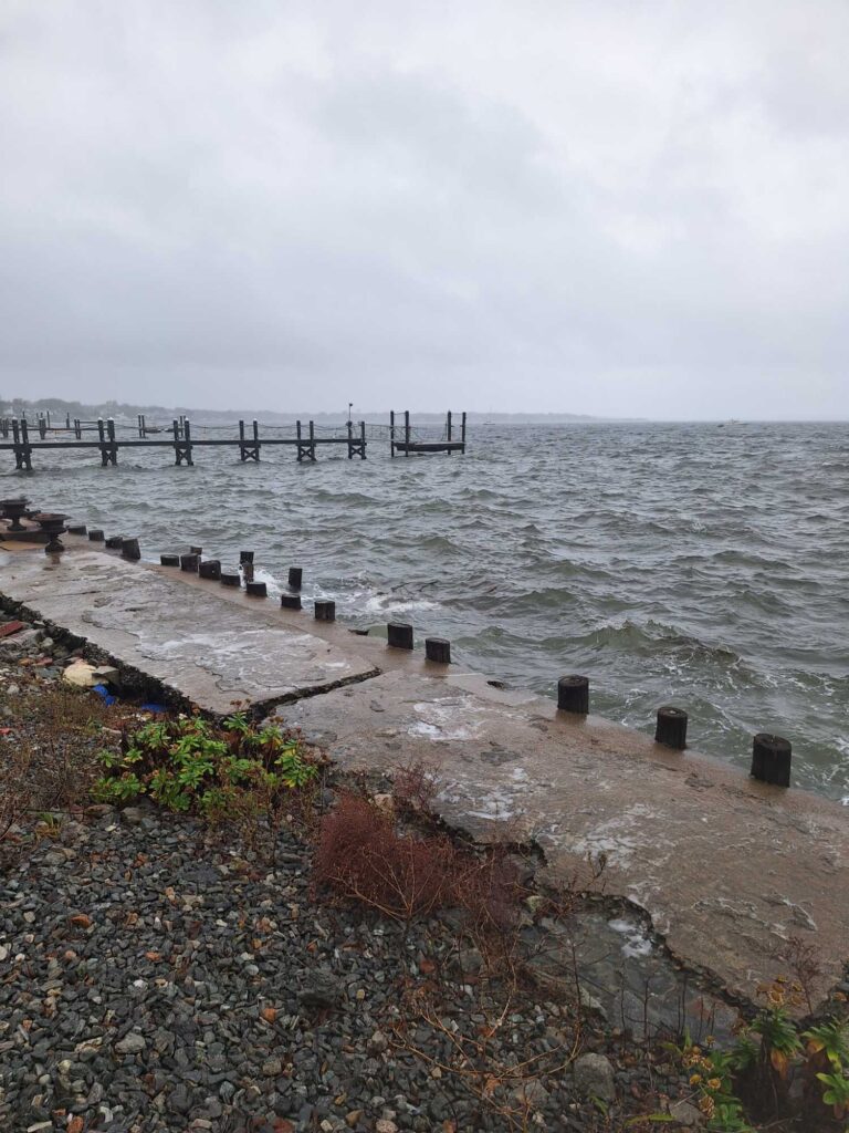 a rocky beach with a pier (MyCoast AI)