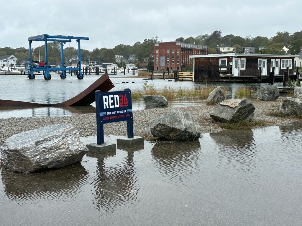 a sign on a dock (MyCoast AI)