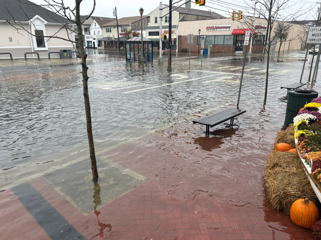 a flooded street with a bench (MyCoast AI)