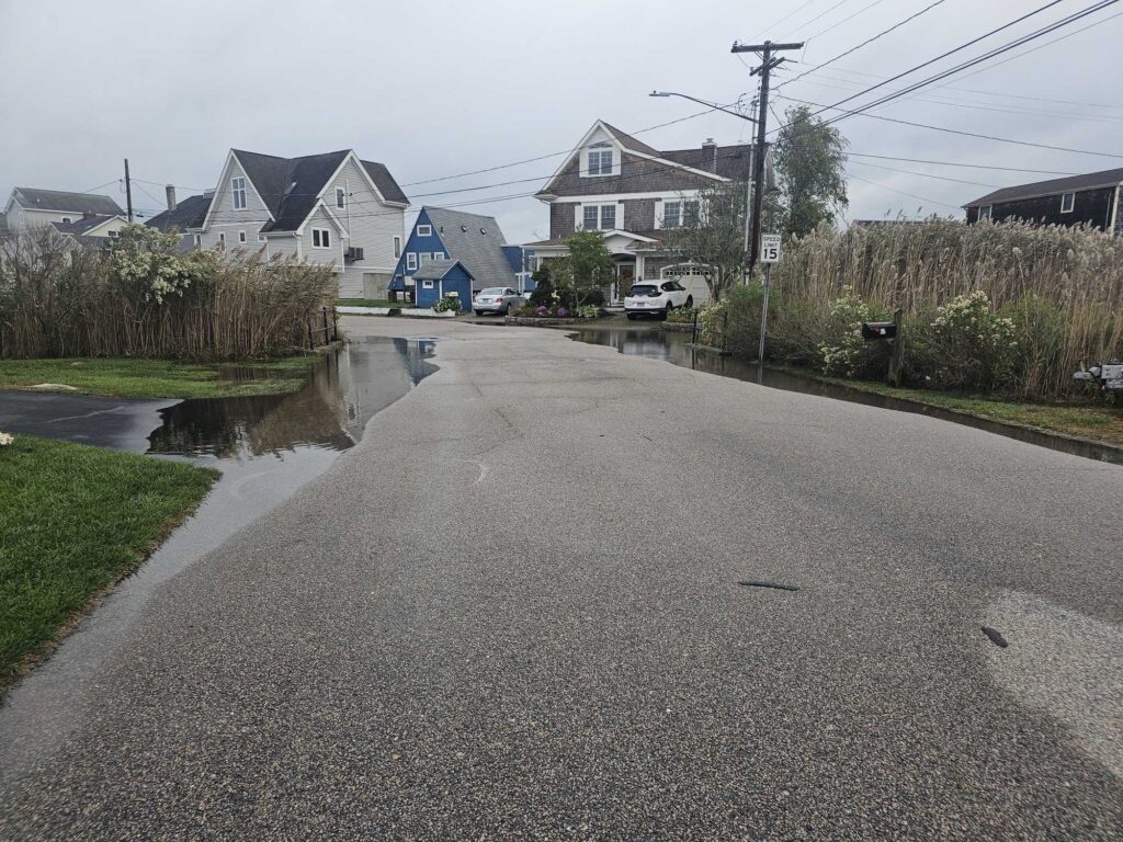 a road with houses along it (MyCoast AI)