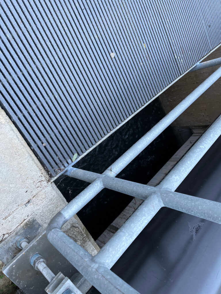 a close-up of a metal grate (MyCoast AI)