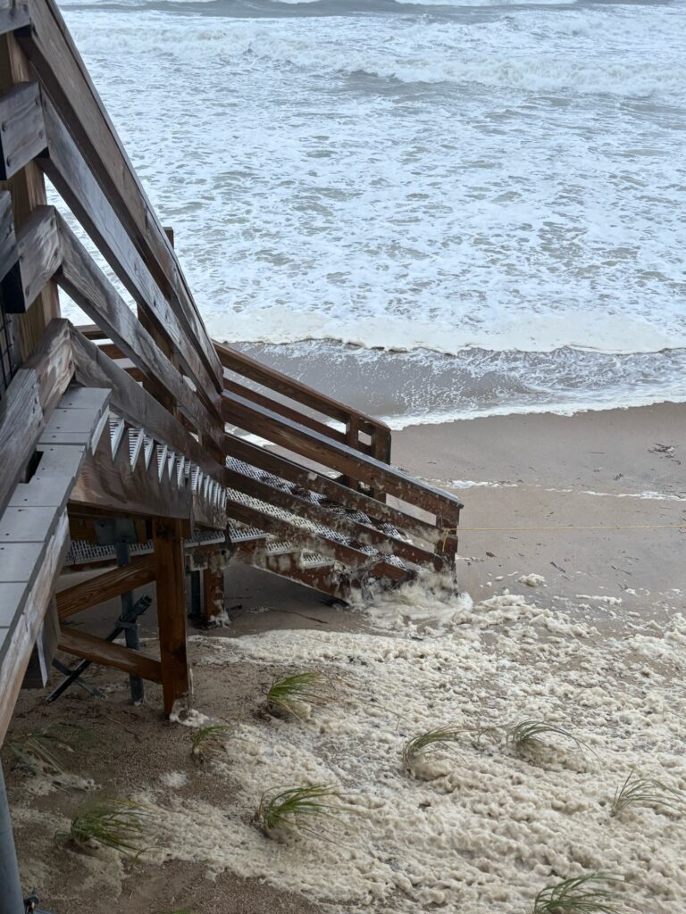 a wooden structure on a beach (MyCoast AI)
