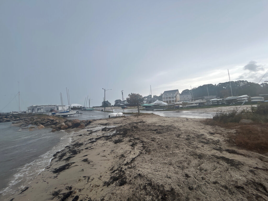a beach with boats and buildings (MyCoast AI)
