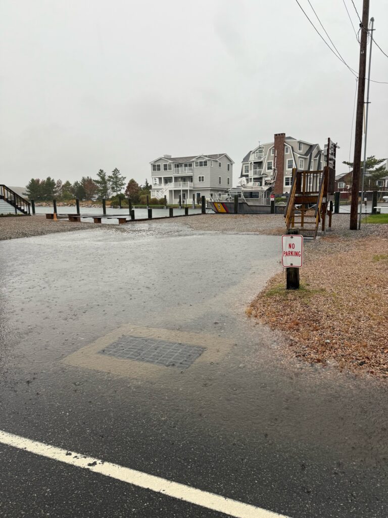 a road with a sign on it (MyCoast AI)