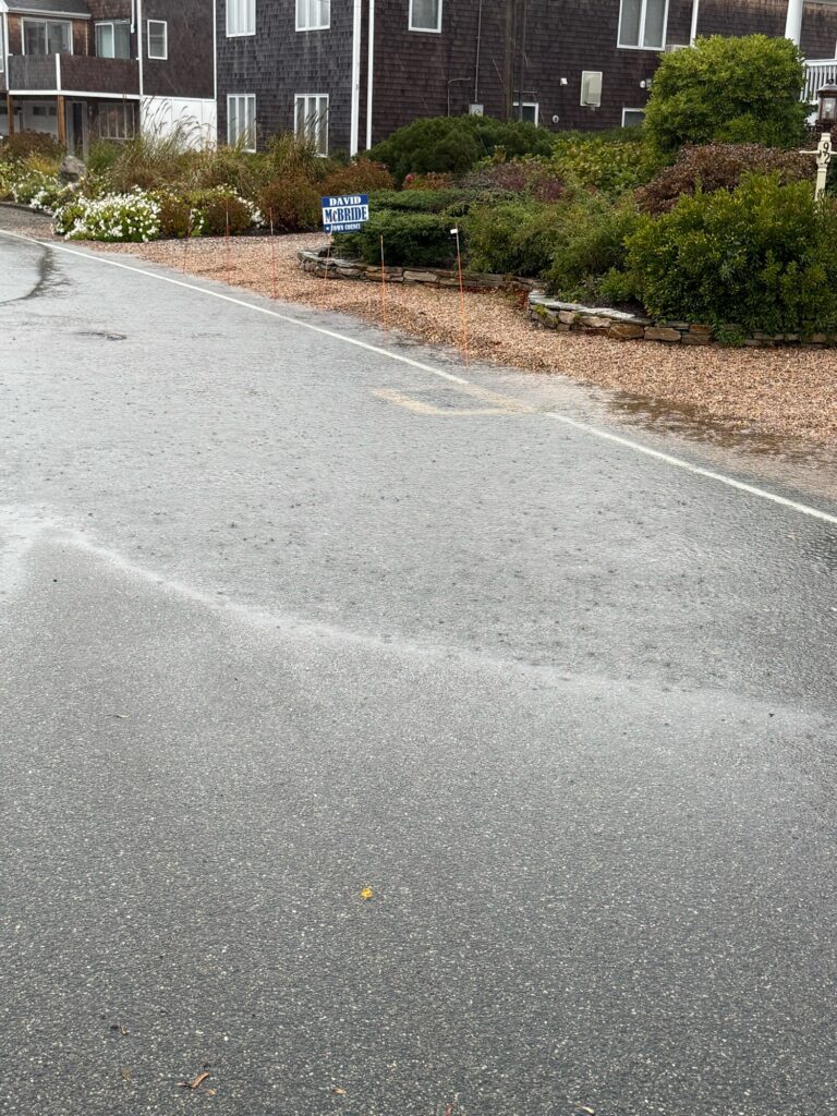 a road with a sign on it (MyCoast AI)