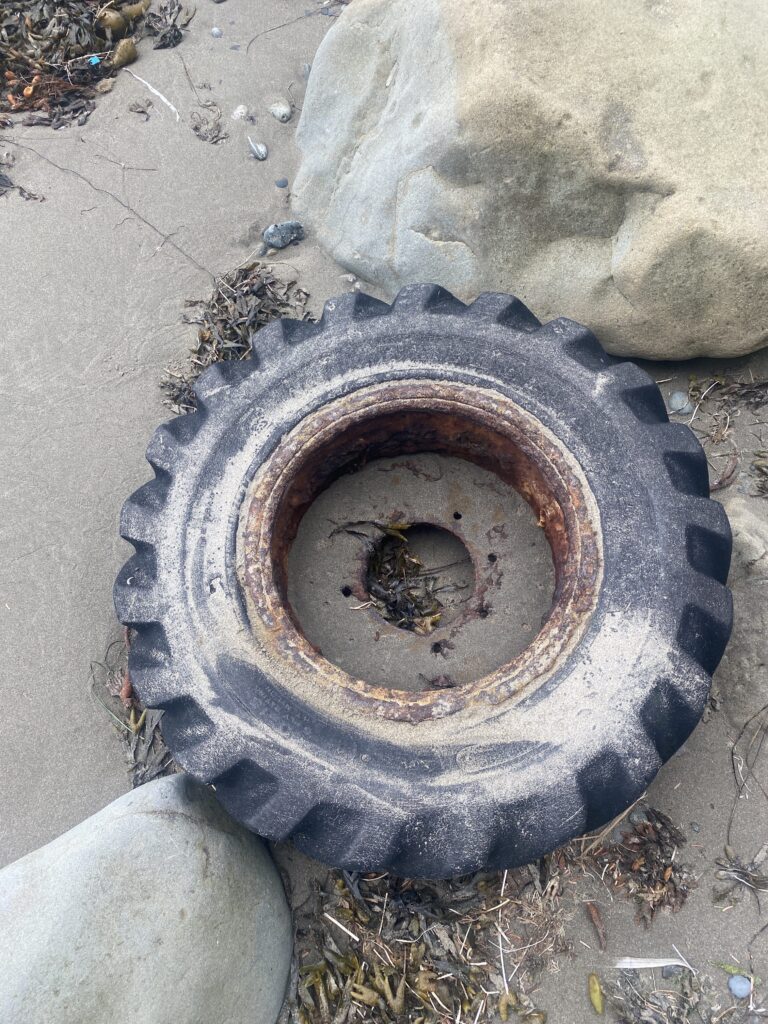 a tire on the ground (MyCoast AI)