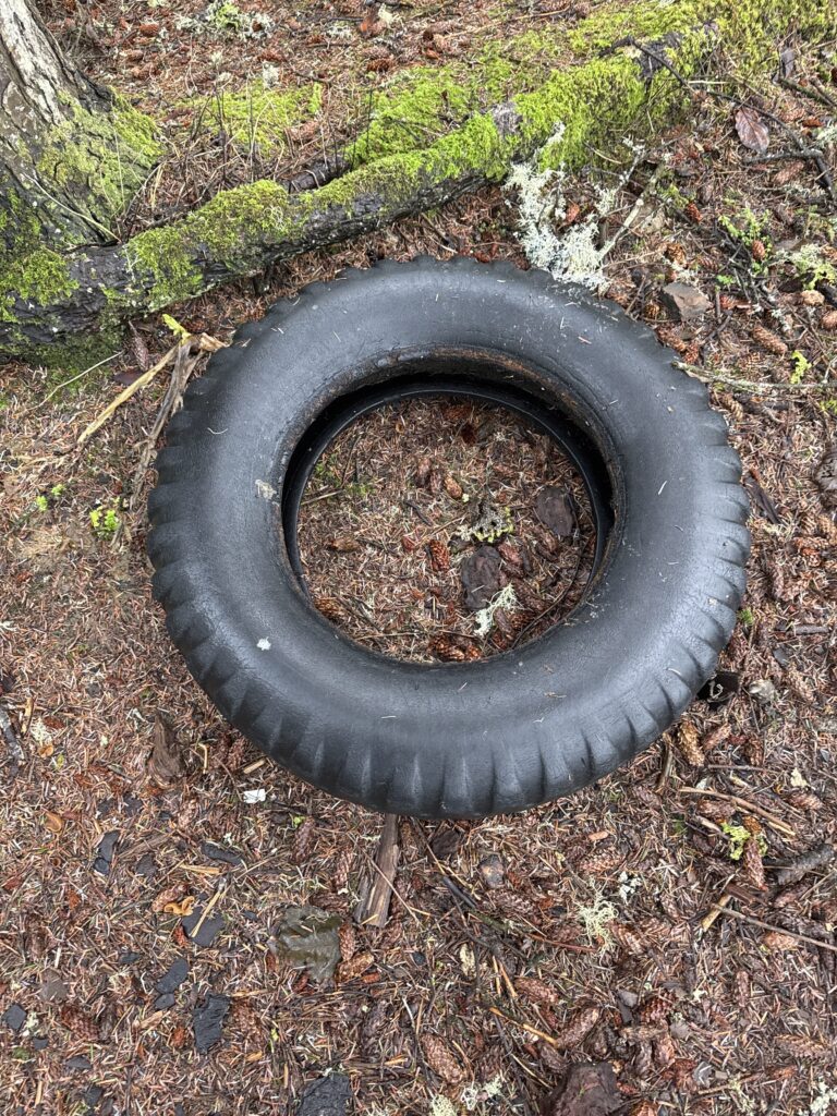 a tire on the ground (MyCoast AI)