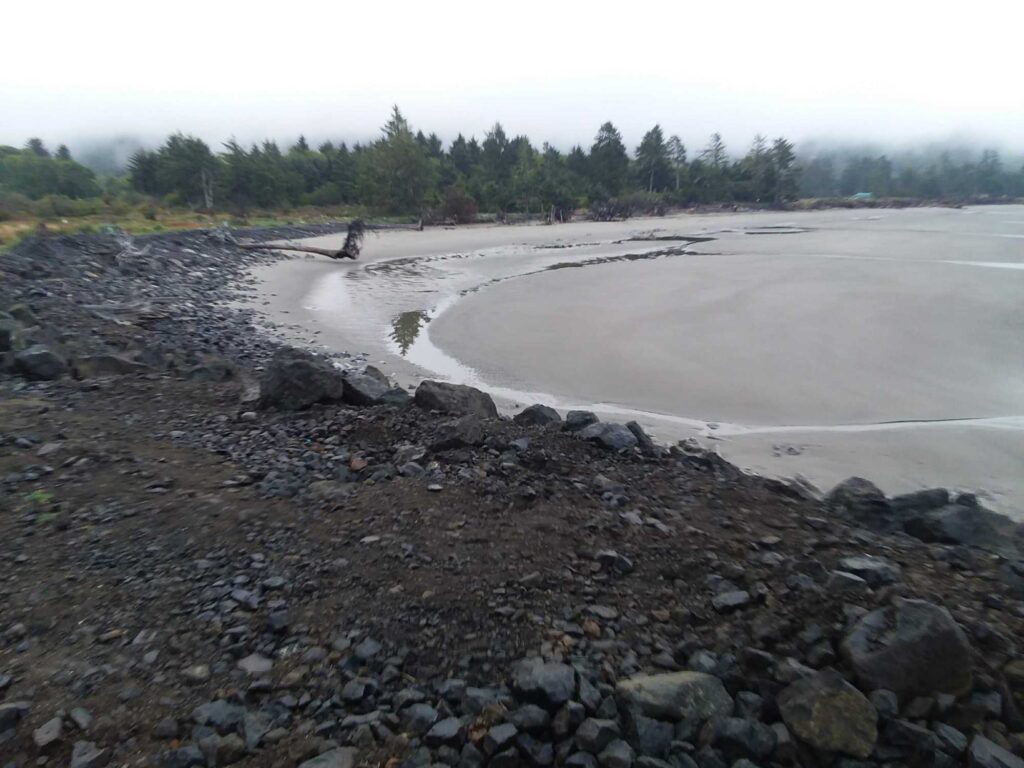 a person riding a bicycle on a beach (MyCoast AI)