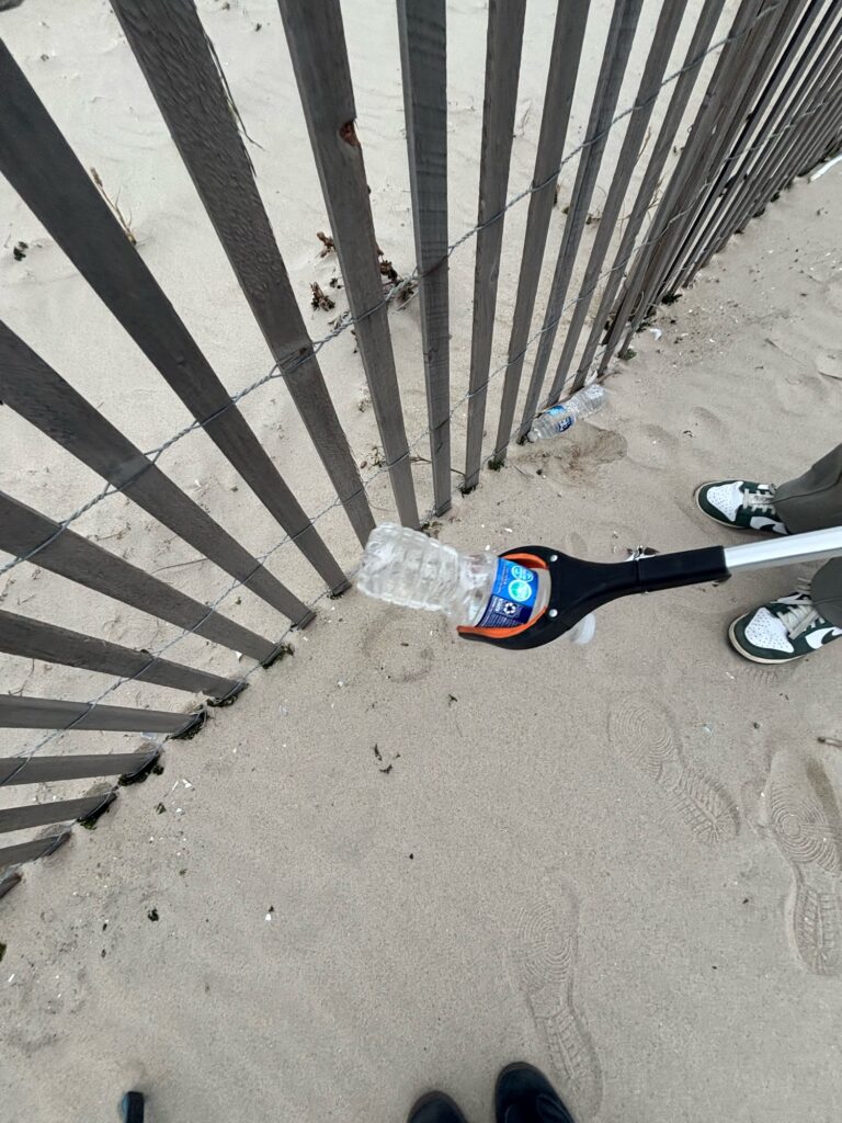 a bottle of water on the ground (MyCoast AI)