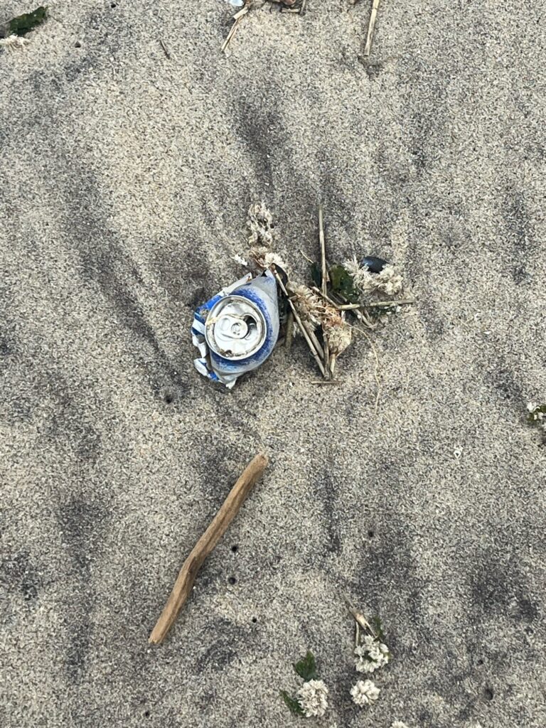 a broken wheel on the ground (MyCoast AI)