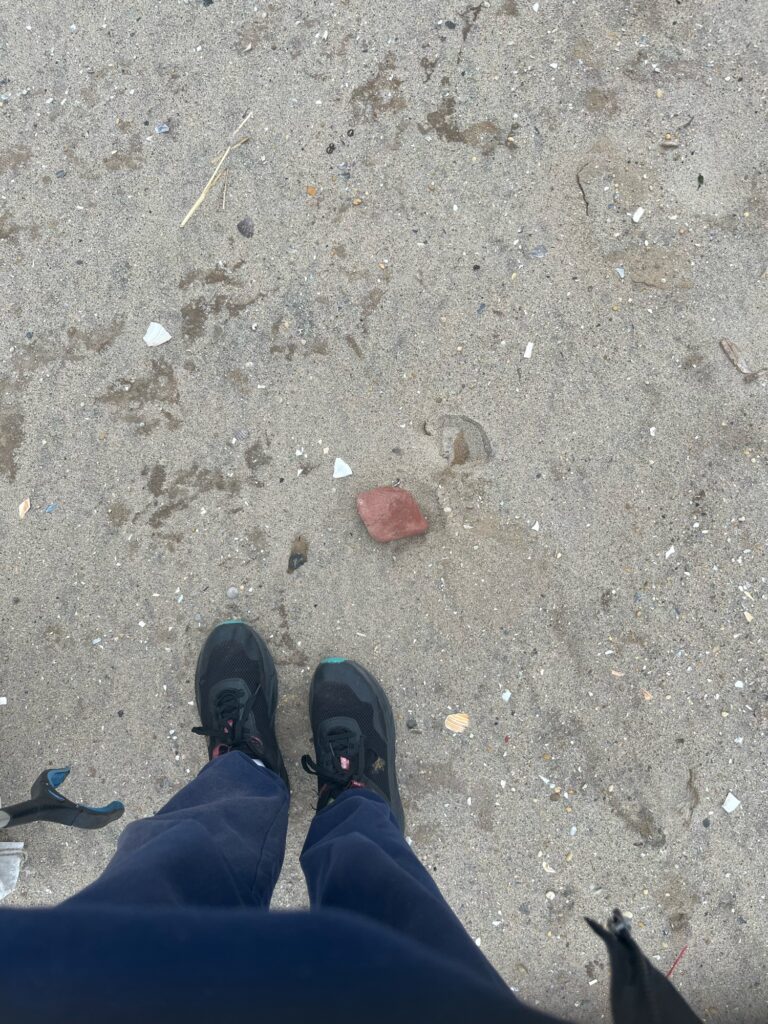 a person's feet on a rocky surface (MyCoast AI)