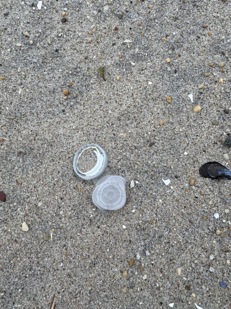 a can on the ground (MyCoast AI)