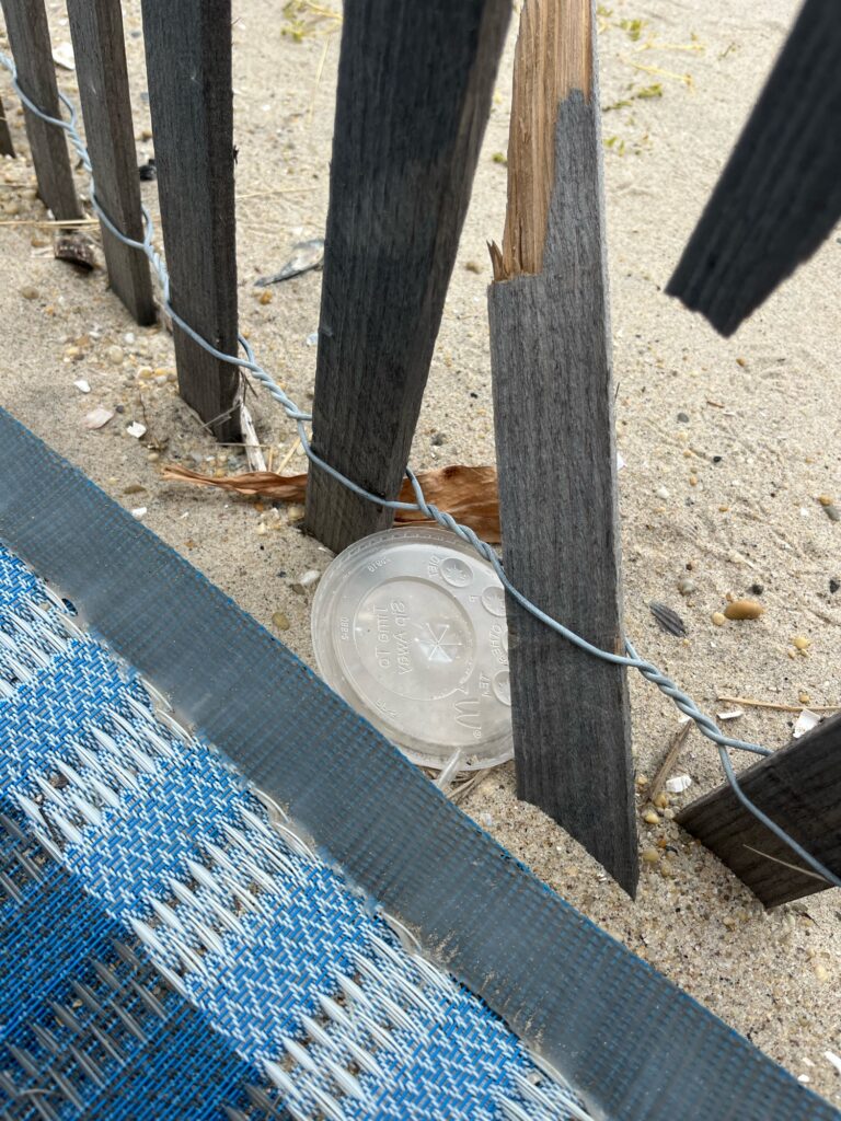 a bucket on a blue mat (MyCoast AI)