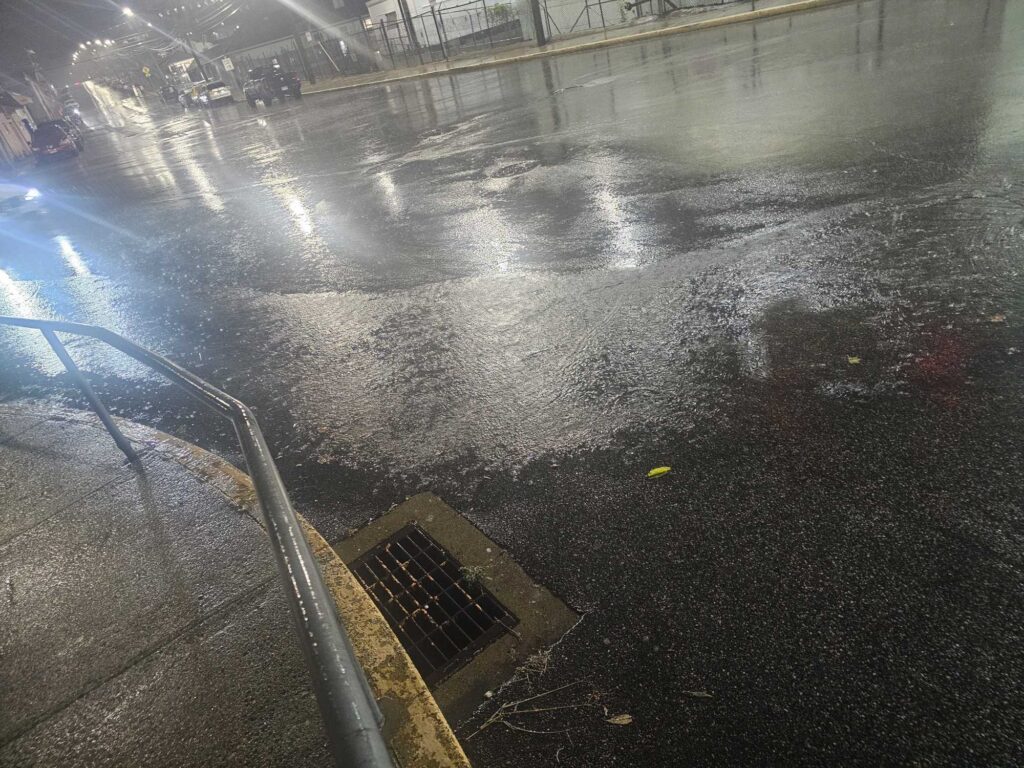 a flooded street with a bridge (MyCoast AI)