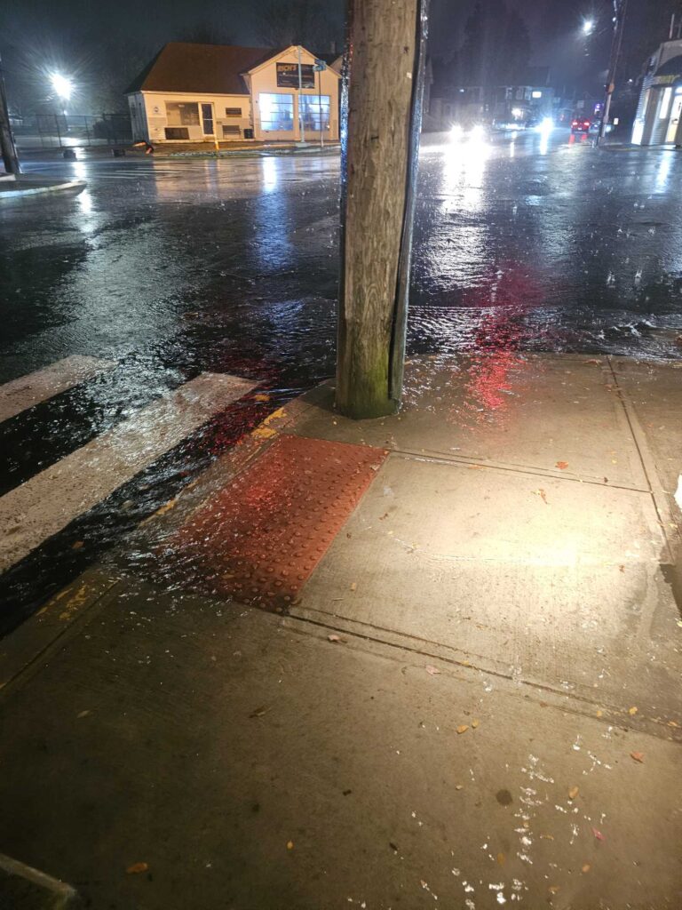 a wet street at night (MyCoast AI)