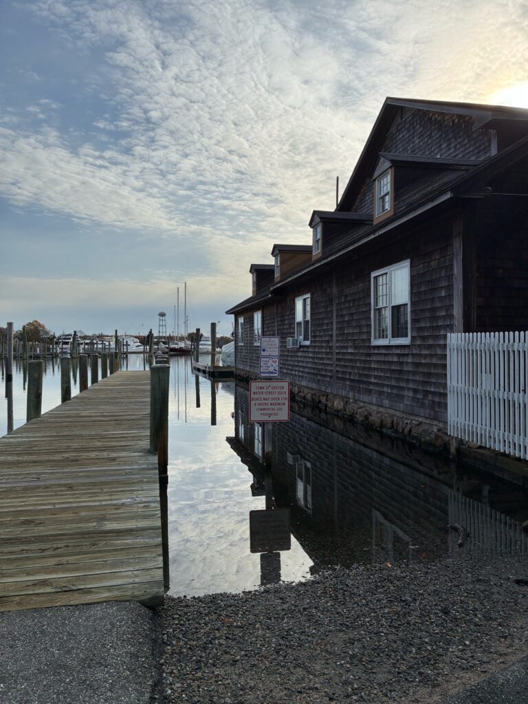 a wooden dock leading to a building (MyCoast AI)