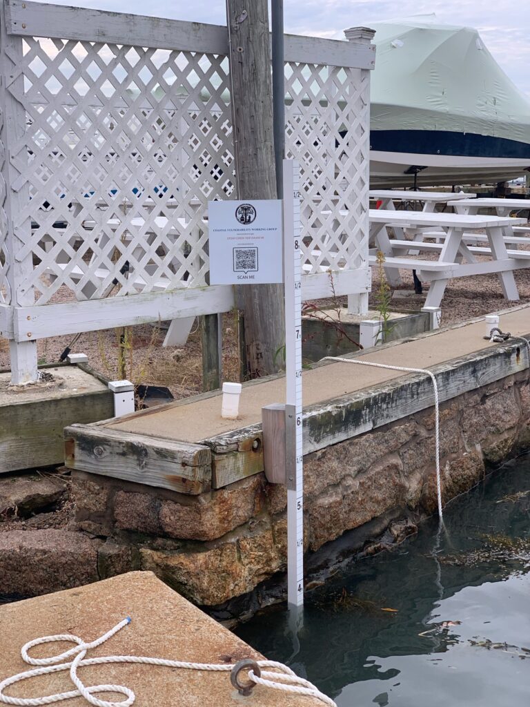 a water fountain with a sign (MyCoast AI)