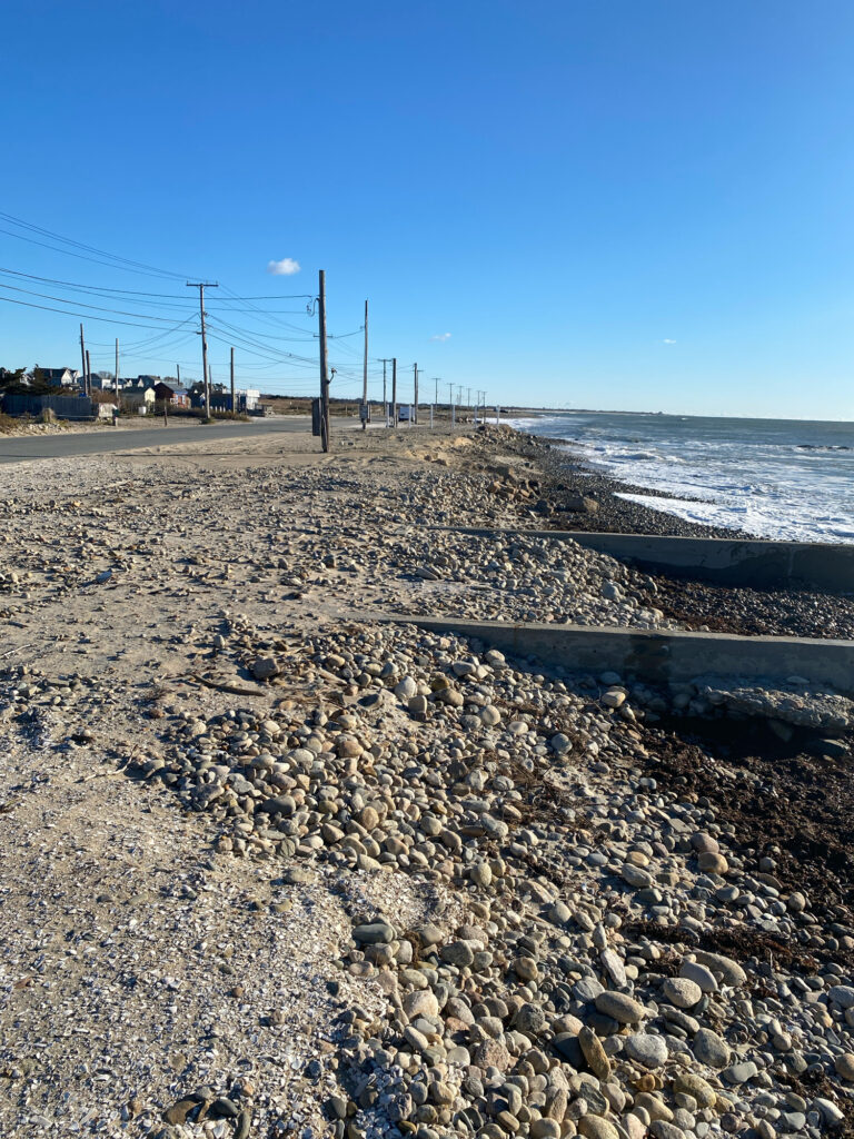 a rocky beach with power lines (MyCoast AI)