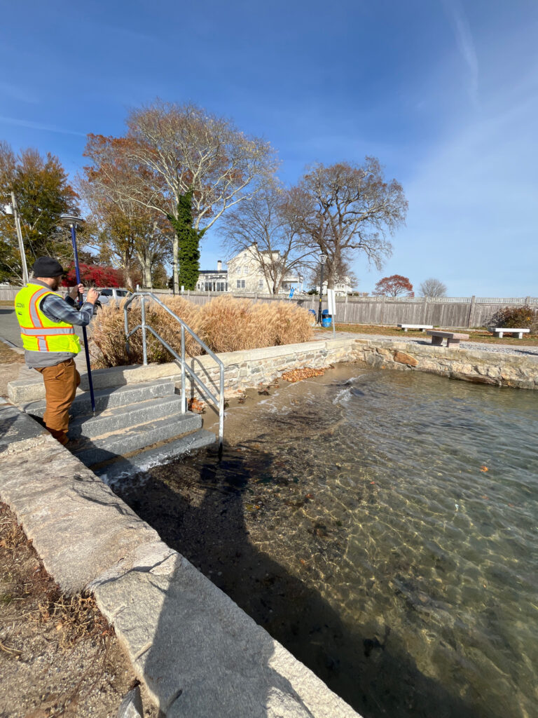 a person standing next to a river (MyCoast AI)