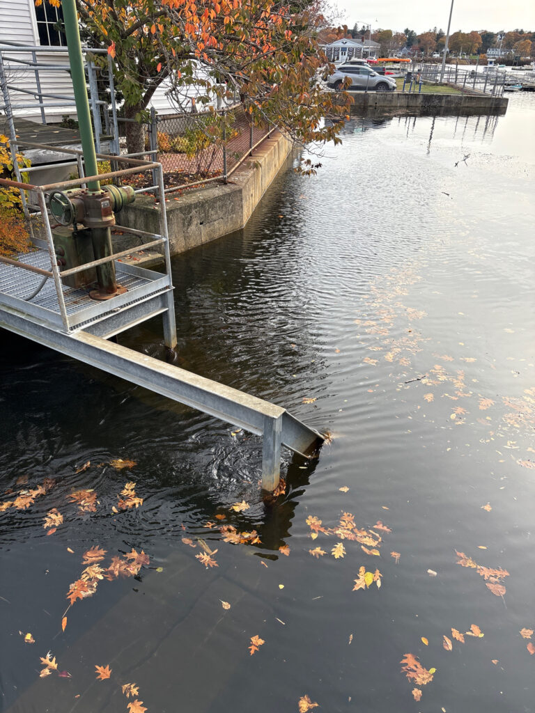 a flooded street with a bench (MyCoast AI)