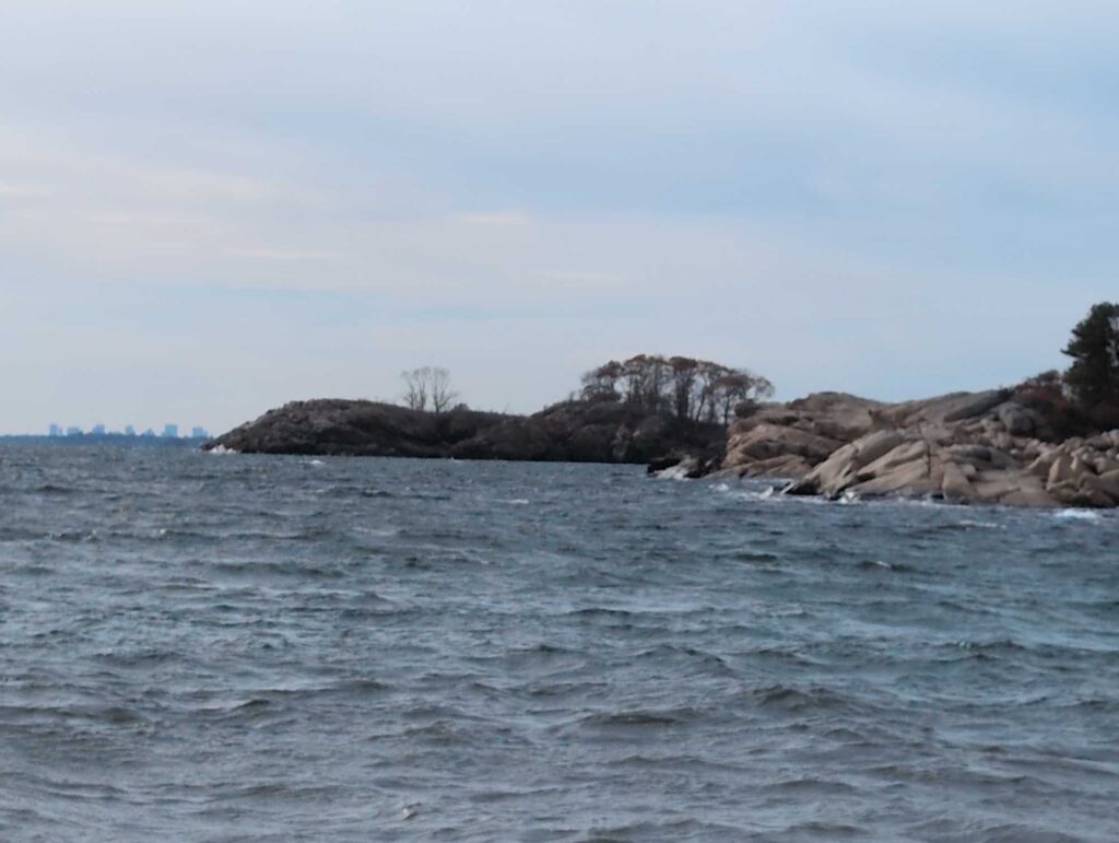 a rocky island in the water (MyCoast AI)