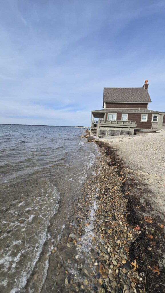 a house on a rocky shore (MyCoast AI)