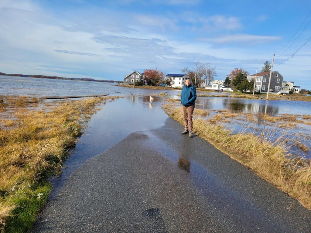 a person standing on a wet road (MyCoast AI)
