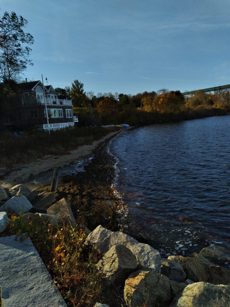 a house on the edge of a lake (MyCoast AI)