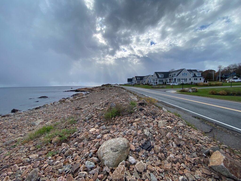 a road next to a rocky beach (MyCoast AI)