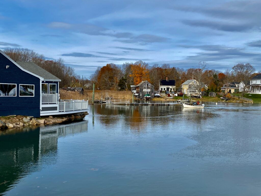 a body of water with houses along it (MyCoast AI)