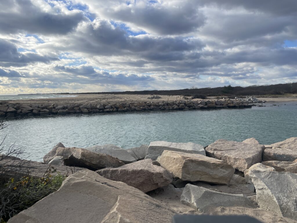 a body of water with rocks on the side (MyCoast AI)