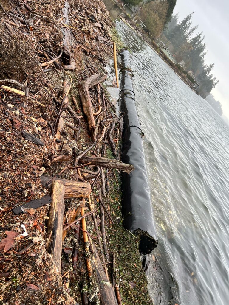 a waterfall with a wooden fence (MyCoast AI)